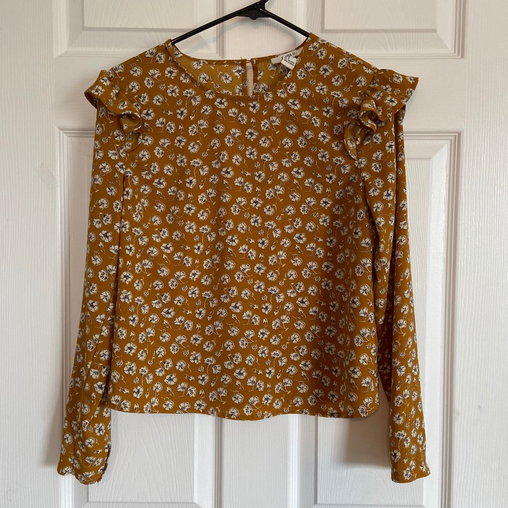 Long sleeve, airy blouse.